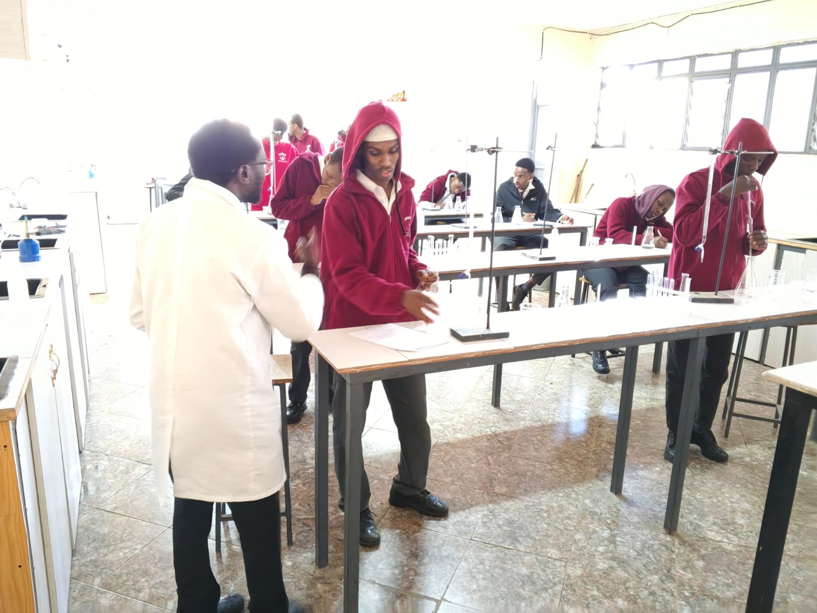 Teacher circulating during practicals